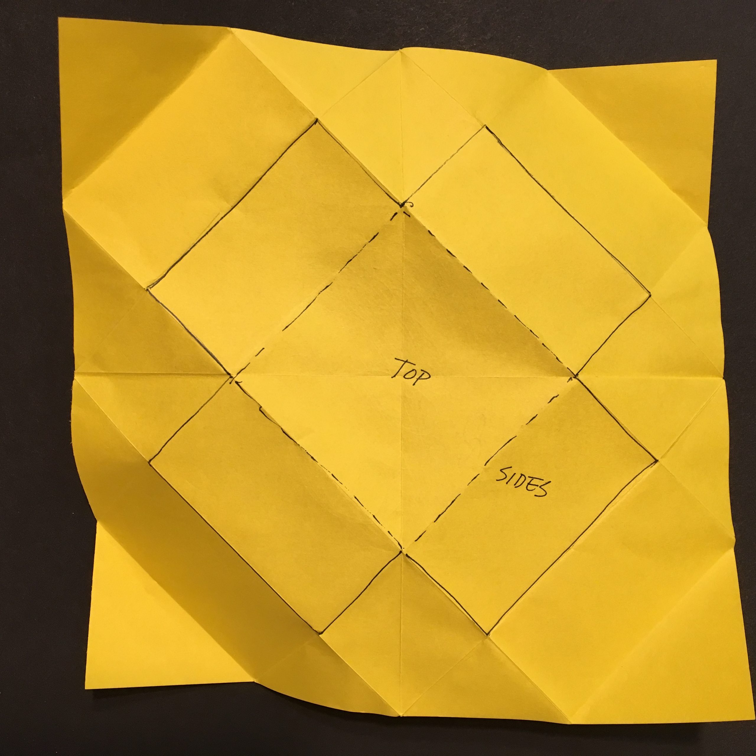 Sheet of paper marked for cutting to serve as a template